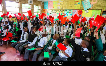 Soweto, South Africa - October 26 2011: African Children in Primary School Classroom Stock Photo