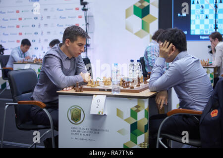 St. Petersburg, Russia - December 27, 2018: Match Dmitry Andreikin, Russia (left) vs Yu Yangyi, China during King Salman World Rapid Chess Championshi Stock Photo