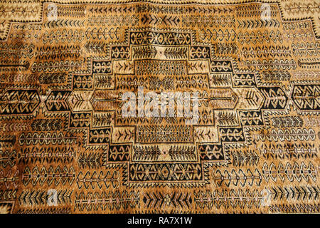 Texture of indian traditional wool carpet with geometric pattern,India Stock Photo
