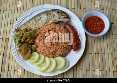 spicy fried rice with shrimp paste sauce and mackerel on dish Stock Photo