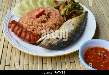 spicy fried rice with shrimp paste sauce and mackerel on dish Stock Photo