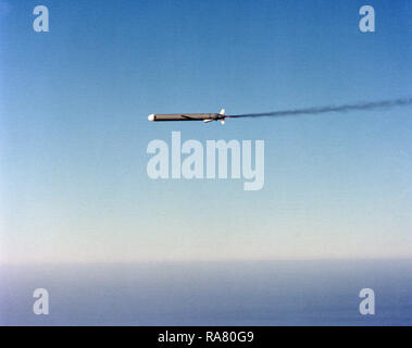 1979 - A left side view of an AGM-109 Tomahawk air-launched cruise missile in flight after release from a B-52 Stratofortress aircraft. Stock Photo