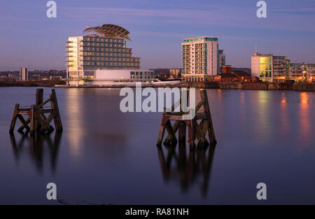 View across Cardiff Bay to St. David's Hotel & Spa and Ocean Reach apartments, Cardiff, Wales, UK Stock Photo