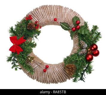 Christmas  homemade New Years garland wreath  ??from pine and fir tree cones, rope, branches and red berries. Isolated on white studio closeup  shot Stock Photo