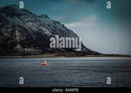 Lone fishing boat near Ornes, Norway. Stock Photo
