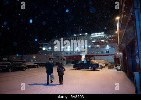 Passengers returning to the Hurtigruten MS Polarlys at Honningsvag, Norway. Stock Photo