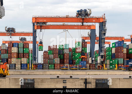 ROTTERDAM - AUG 23, 2017: Sea containers stacked in the Port of Rotterdam. Stock Photo