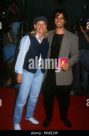 HOLLYWOOD, CA - JULY 19: Comedian/television personality Ellen DeGeneres and actor Johnathon Schaech attend Paramount Pictures' 'Coneheads' Premiere on July 19, 1993 at Mann Chinese Theatre in Hollywood, California. Photo by Barry King/Alamy Stock Photo Stock Photo