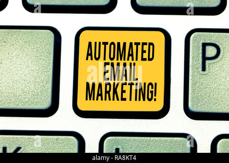 Handwriting text writing Automated Email Marketing. Concept meaning Email sent automatically to list of showing Keyboard key Intention to create compu Stock Photo