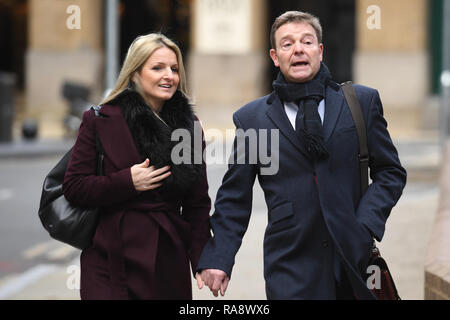 Conservative MP Craig Mackinlay with his wife Kati arrive at Southwark Crown Court in London, where he is on trial alongside staff accused of overspending on expenses during his successful 2015 general election campaign gainst the then-Ukip leader, Nigel Farage, in South Thanet, Kent. Stock Photo