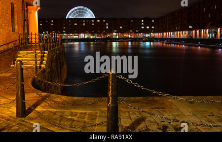 Albert Dock, Liverpool, Ferris wheel in the background. Image taken in October 2018. Stock Photo