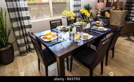 Modern Wooden Table And Chairs With Six Place Settings Stock Photo
