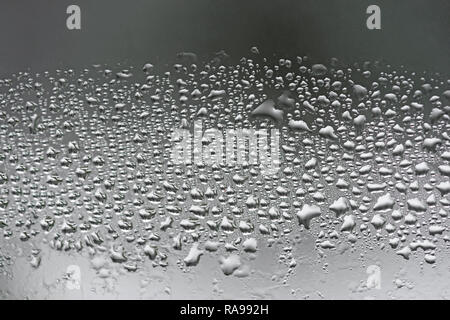 Condensation on glass closeup double glazing water drops Stock Photo