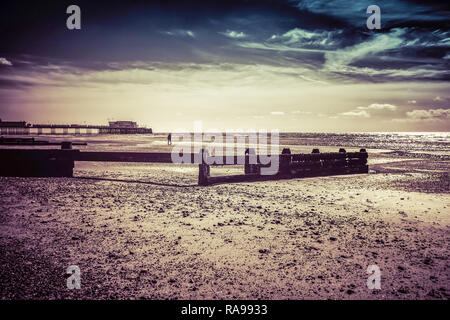 Colourised view of worthing beach and pier, West Sussex Stock Photo