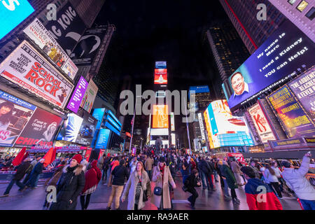 Visitors and tourists visit the Times Square, New York City, New York. Stock Photo
