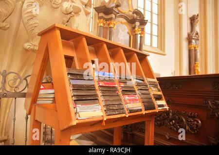 Hymn books for prayers in church. The bibles and hymnals Stock Photo