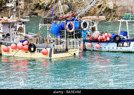 Fishing boats moored in Newquay Harbour Harbor in Newquay in Cornwall. Stock Photo