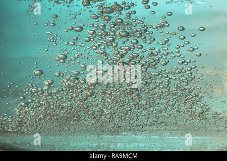 lot of bubbles in blue water Stock Photo