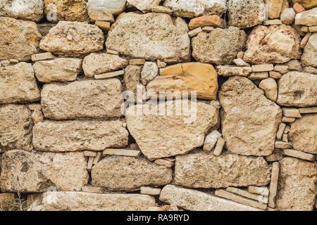 Old grunge stone background. Horizontal color photography. Stock Photo
