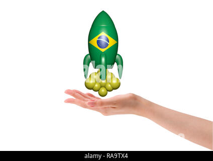 hand, rocket with flag of Brazil indicating economic growth of the country. white background. 3D illustration Stock Photo