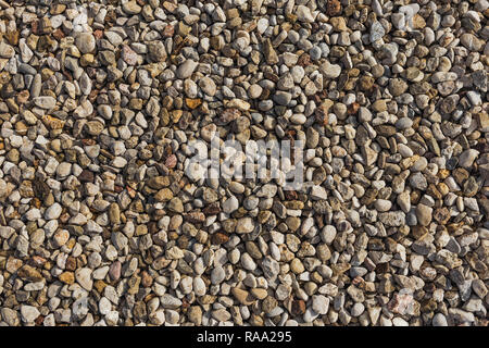 Abstract top view background of many stones. Horizontal color photography. Stock Photo