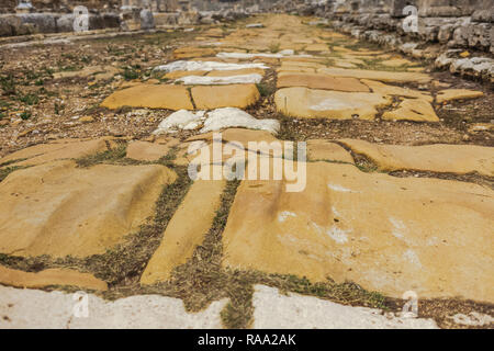 Low angle of stone ancient road or sidewalk in ancient city. Horizontal color photography. Stock Photo