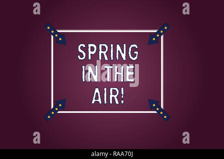 Handwriting text Spring In The Air. Concept meaning Natural feeling beautiful season flowers everywhere Square Outline with Corner Arrows Pointing Inw Stock Photo