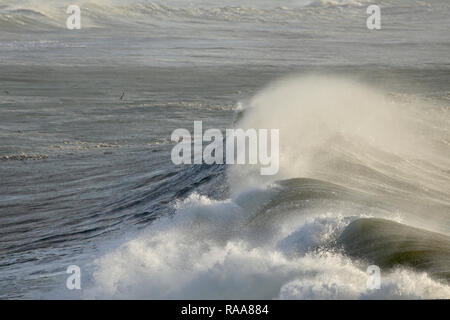 Huge breaking sea wave as seen from above. Stock Photo