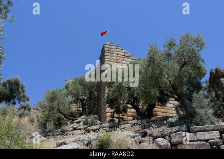 Section of the retaining wall of the Hellenistic theatre situated in the hillside overlooking the ancient city of Alinda, Caria, Anatolia, Turkey. Dat Stock Photo