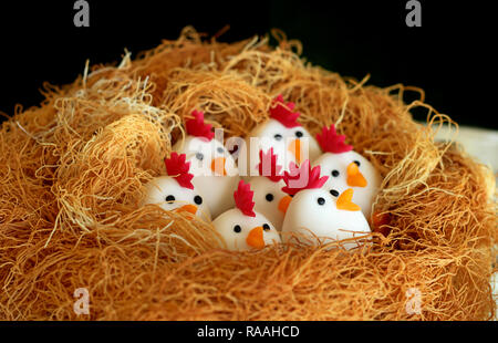 Easter chicken nest marzipan art Stock Photo