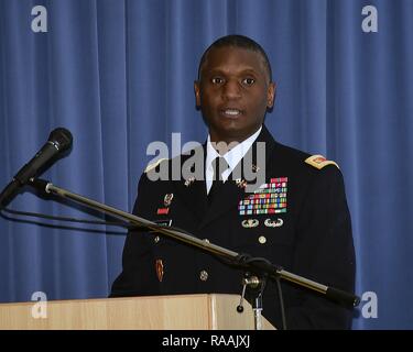 U.S. Army Maj. (P) Joseph Gardner, regional affairs officer with the Plans and Strategy Division at the George C. Marshall European Center for Security Studies, talks about Dr. King’s legacy during his speech as the guest speaker of the Marshall Center Equal Opportunity and Diversity Observances Committee’s Dr. Martin Luther King Jr. celebration “Remember!  Celebrate!  Act! A Day On, Not A Day Off” Jan. 18 in the Garmisch Elementary Middle School multi-purpose room. (Marshall Center Stock Photo