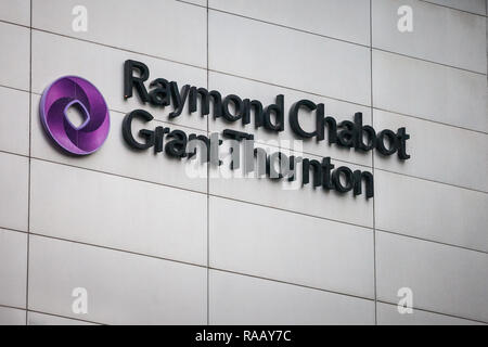 MONTREAL, CANADA - NOVEMBER 6, 2018: Raymond Chabot Grand Thornton logo on one of their heaquarters in Montreal, Quebec. It is a Professional Services Stock Photo