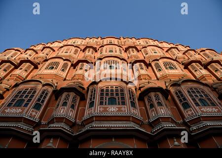 Sunrise at the Hawa Mahal, or "Palace of the Winds", a sandstone palace in Jaipur, Rajasthan, India. Stock Photo