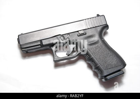 Black semi-automatic pistol isolated on white background Stock Photo ...