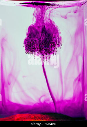 potassium permanganate art in solution Stock Photo