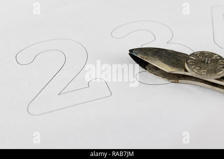 Nib for drafts on a white sheet. Drawing tools needed to draw technical drawings. Light background. Stock Photo