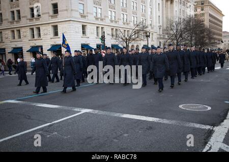 U.S. Airmen from the 459th Air Refueling Wing march down Pennsylvania Avenue during the Department of Defense Dress Rehearsal, Washington, D.C., Jan. 15, 2017. More than 5,000 military members from across all branches of the armed forces of the United States, including Reserve and National Guard components, provided ceremonial support and Defense Support of Civil Authorities during the inaugural period. Stock Photo