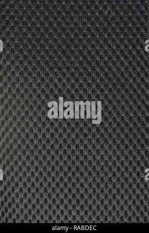 black gray fishnet cloth material as a texture background Stock Photo
