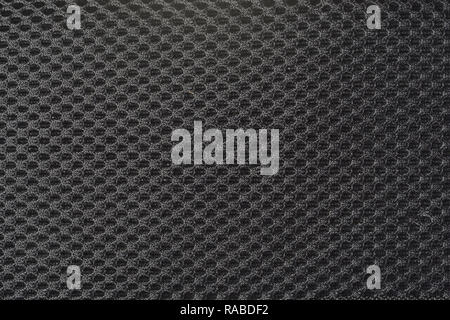 black gray fishnet cloth material as a texture background Stock Photo