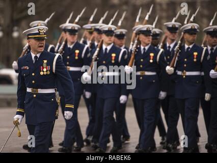 U.S. Coast Guardsmen assigned to the U.S. Coast Guard Ceremonial Honor Guard march during the pass in review at the 58th Presidential Inauguration in Washington, D.C., Jan. 20, 2017. More than 5,000 military members from across all branches of the armed forces of the United States, including reserve and National Guard components, provided ceremonial support and Defense Support of Civil Authorities during the inaugural period. Stock Photo