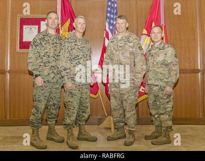 Sgt. Maj. Patrick L. Kimble (left), sergeant major of Marine Forces Reserve and Marine Forces North, Lt. Gen. Rex C. McMillian (second from-left), commander of MARFORRES and MARFORNORTH, pose for a photo with Lt. Gen. Jeffrey S. Buchanan (second from-right), commander of United States Army North (Fifth Army) and senior commander, Fort Sam Houston and Camp Bullis, and Command Sgt. Maj. Ronald E. Orosz, command sergeant major U.S. Army North (Fifth Army) and senior enlisted leader, Fort Sam Houston and Camp Bullis, at Marine Corps Support Facility New Orleans, Jan. 24, 2017. Buchanan stopped by  Stock Photo
