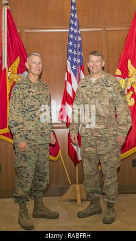 Lt. Gen. Rex C. McMillian (left), commander of Marine Forces Reserve and Marine Forces North, pose for a photo with Lt. Gen. Jeffrey S. Buchanan (right), commander of United States Army North (Fifth Army) and senior commander, Fort Sam Houston and Camp Bullis, at Marine Corps Support Facility New Orleans, Jan. 24, 2017. Buchanan stopped by the facility on his way to Joint Readiness Center aboard Fort Polk, La., to meet with McMillian and to attend a MARFORNORTH command brief. Stock Photo