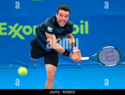 Doha, Qatar. 2nd Jan, 2019. Roberto Bautista Agut of Spain serves during the singles second round match against Guillermo Garcia-Lopez of Spain at the ATP Qatar Open Tennis match in Doha, capital of Qatar, Jan. 2, 2019. Credit: Nikku/Xinhua/Alamy Live News Stock Photo