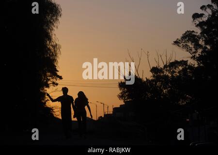 Tandil, Buenos Aires, Argentina. 2nd Jan, 2019. A couple walks hand in hand at sunset through an ''aerobic route'' in the sierra of Tandil, a popular touristic destination in the province of Buenos Aires. Credit: Patricio Murphy/ZUMA Wire/Alamy Live News Stock Photo