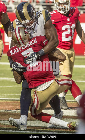 Santa Clara, California, USA. 2nd Nov, 2014. St. Louis Rams defensive end Robert Quinn (94) sacks San Francisco 49ers quarterback Colin Kaepernick (7) on Sunday, November 2, 2014 in Santa Clara, California. The Rams defeated the 49ers 13-10. Credit: Al Golub/ZUMA Wire/Alamy Live News Stock Photo