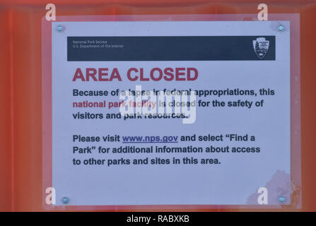 Assateaque, MD, December 29, 2018, USA: A sign at a closed rest room in the Assateaque Island National Park in Maryland explains why the facility is closed. The National Park service has closed most of the United States parks because the funding for the parks has run out due to the US Government shutdown. Patsy Lynch/MediaPunch
