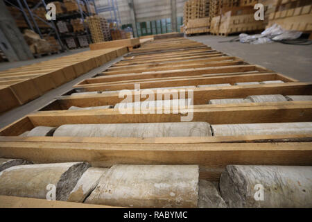 06 December 2018, Thuringia, Harth-Pölnitz: Drill cores from the Ballstadt potash region from 1963 lie in wooden boxes. The Geological Sample Archive Thuringia is one of the largest core repositories in Germany. Photo: Bodo Schackow/dpa-Zentralbild/ZB Stock Photo