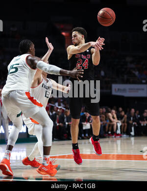 January 03, 2019: North Carolina State Wolfpack guard Devon Daniels (24) passes the ball during an NCAA men's basketball game against the University of Miami Hurricanes at the Watsco Center in Coral Gables, Florida. The NC State Wolfpack won 87-82. Mario Houben/CSM Stock Photo