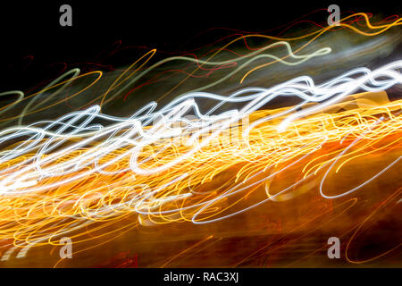 Night city street lights background and street lights blur bokeh,Colorful circles of light abstract background. Stock Photo
