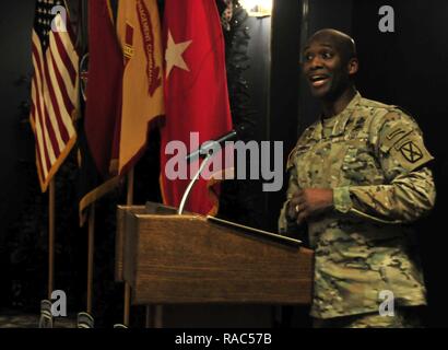 Brig. Gen. Xavier Brunson, 10th Mountain Division (LI) Deputy Commanding General, addresses approximately 200 Soldiers and members of the Fort Drum community at an observance honoring Dr. Martin Luther King Jr. at the Commons on January 11, 2017. Brunson highlighted King's message and achievements, urging Soldiers and the community to continue his work. Stock Photo